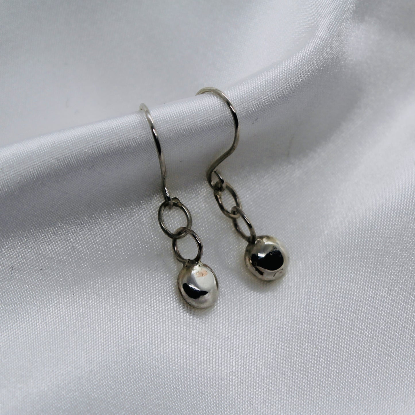 ‘Silver droplet’ earrings